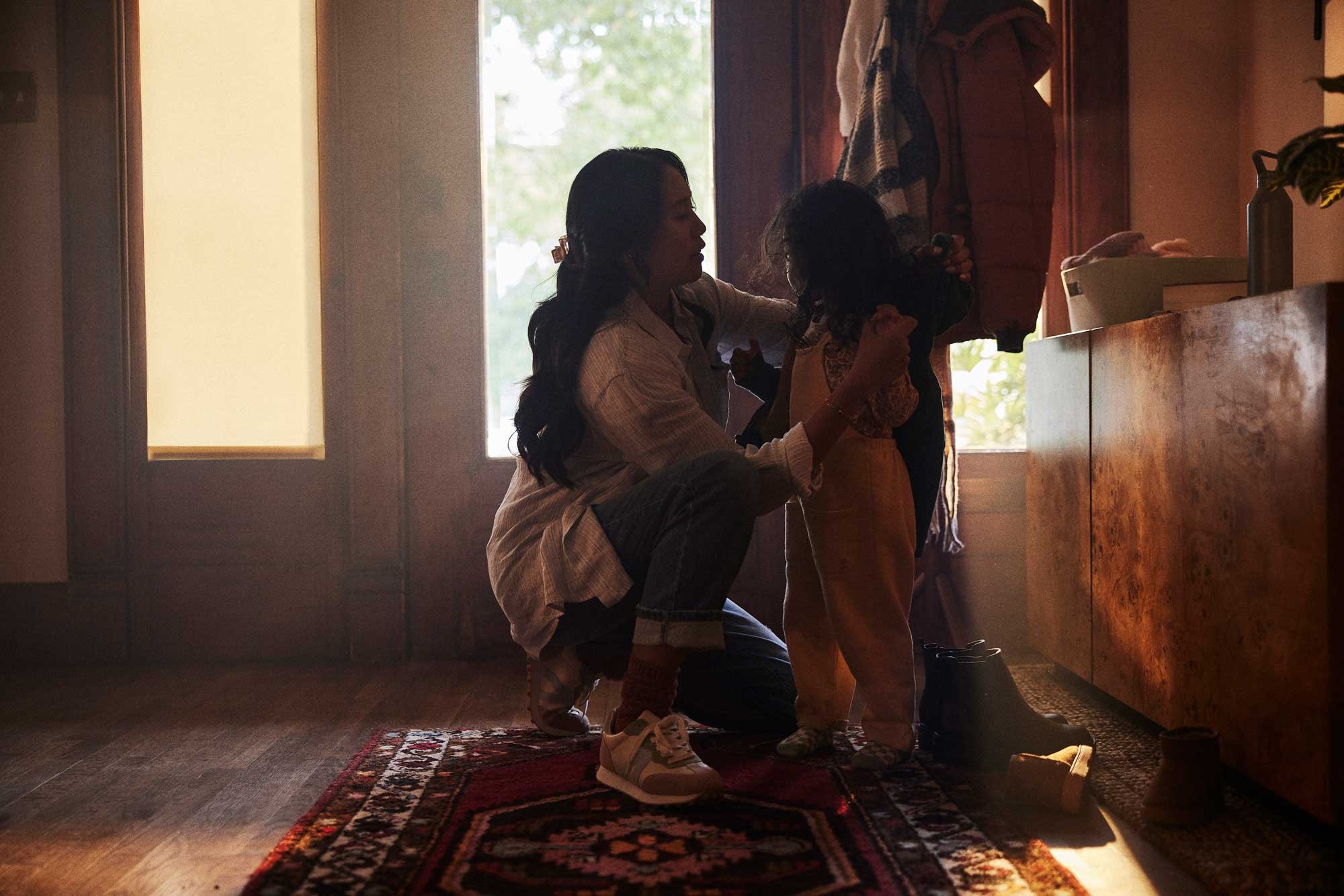 A mother and daughter at home